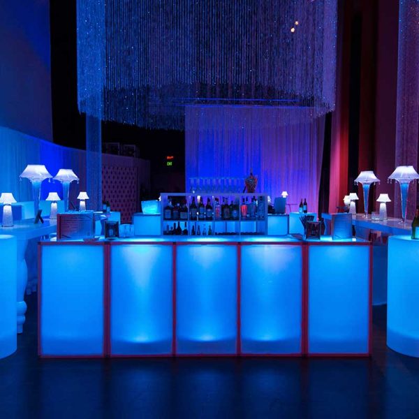 Sky collection bar rental with white ribbon barstools and Sophia white lacquer tables from Niche Event Rentals