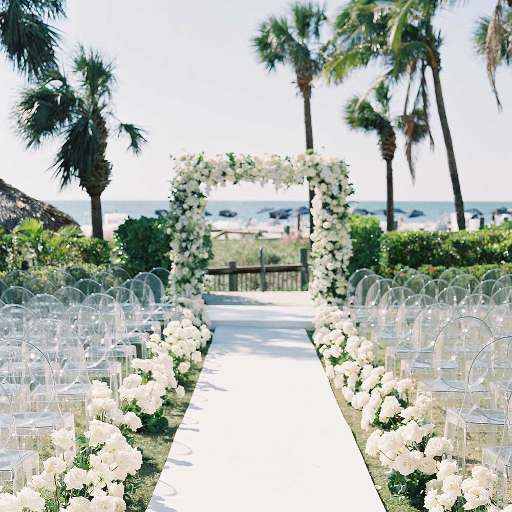 Charming beachfront wedding reception furniture rental | Justin Demutiis Photography, Niche Event Rentals
